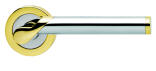 Star light polished chrome and polished brass handle for designer doors and entries.
